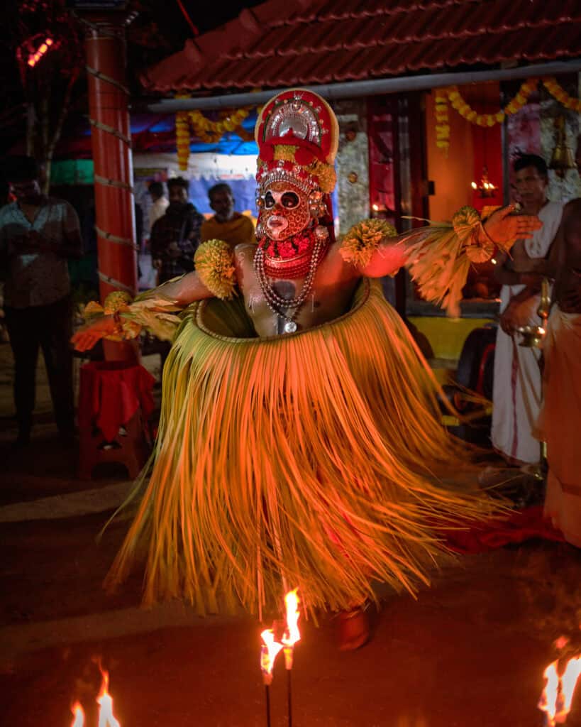 The drums grow louder as the Theyyam takes its first rhythmic strides